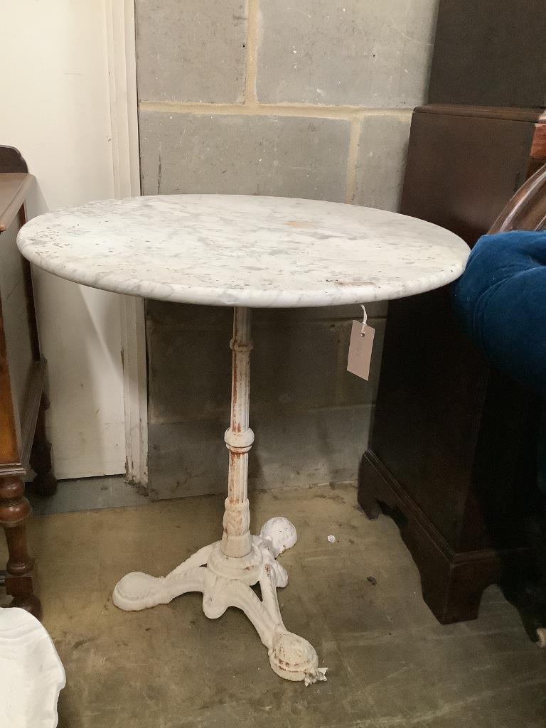 A Victorian style circular marble top and cast iron base garden table, diameter 70cm